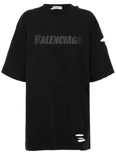 Oversized distressed logo jersey t-shirt - Balenciaga - Women | Luisaviaroma