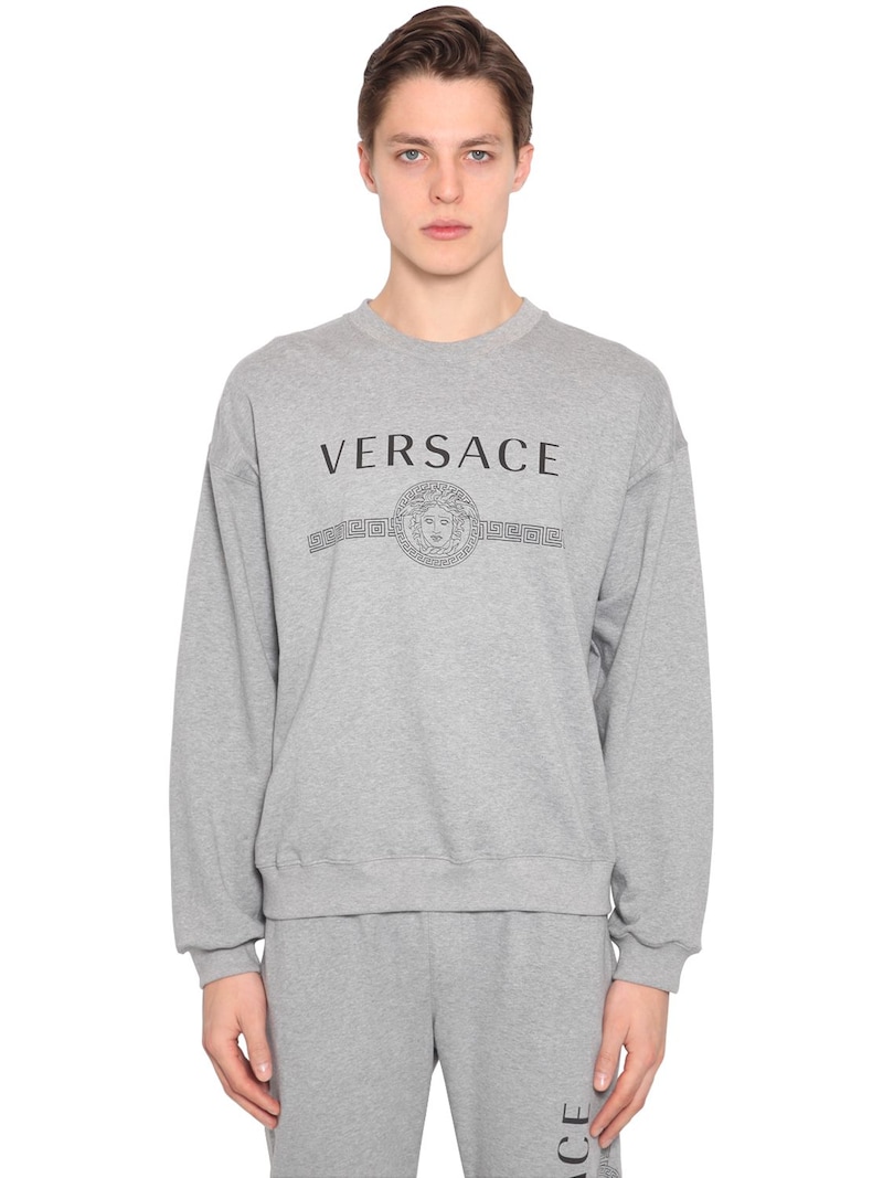 Versace - Logo printed cotton jersey sweatshirt - | Luisaviaroma