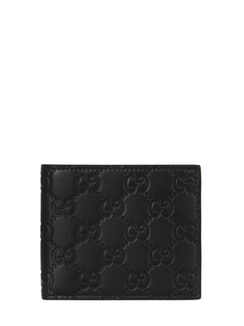 Gucci - Gg embossed leather wallet - Black | Luisaviaroma
