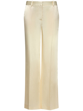 The Row: Encore midrise satin flared pants - Ivory - women_0 | Luisa Via Roma