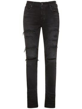 Amiri: Jeans de algodón con lentejuelas - Negro - men_0 | Luisa Via Roma