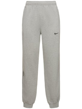 Nike: Pantalon en tissu Fleece Nocta - Gris/Argent - men_0 | Luisa Via Roma