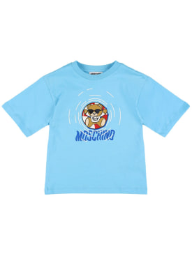 Moschino: T-shirt long en jersey de coton imprimé - Bleu - kids-boys_0 | Luisa Via Roma