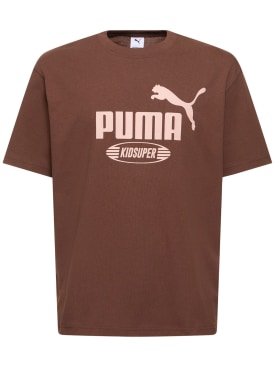 PUMA: T-shirt à logo Kidsuper Studios - Chestnut Brown - men_0 | Luisa Via Roma