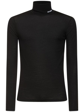 Jil Sander: T-shirt en jersey de laine à col roulé - Noir - men_0 | Luisa Via Roma