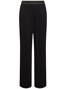 Acne Studios: Parika fluid wool blend suiting pants - Black - women_0 | Luisa Via Roma