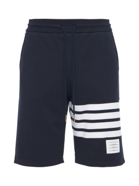 Thom Browne: Intarsia stripes cotton jersey shorts - Navy - men_0 | Luisa Via Roma