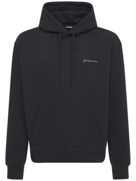 Jacquemus: Le Sweatshirt Brodé cotton jersey hoodie - Black - men_0 | Luisa Via Roma