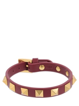 Valentino Garavani: Rockstud leather belt bracelet - Ruby/Gold - men_0 | Luisa Via Roma