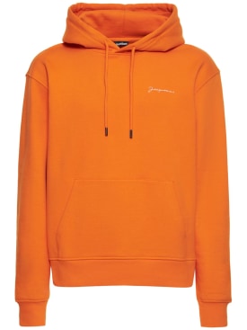 Jacquemus: Le Sweatshirt Brodé cotton jersey hoodie - Orange - men_0 | Luisa Via Roma