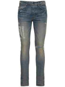 Amiri: Amiri logo distressed jeans - Clay Indigo - men_0 | Luisa Via Roma