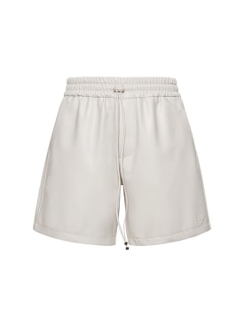 Amiri: Shorts con logo - Bronce - men_0 | Luisa Via Roma