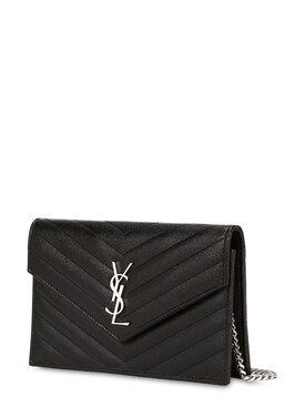 monogram quilted leather clutch