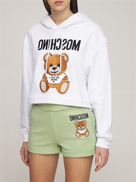 white and blue guess shirt