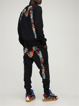 Evisu - Pantaloni in felpa di cotone con logo - Nero | Luisaviaroma