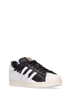 adidas superstar black white sole