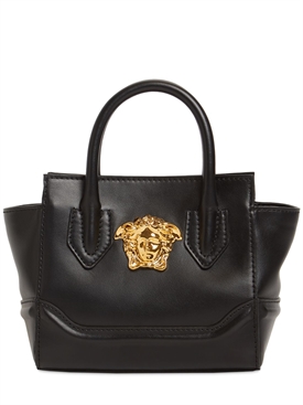 verensacare black handbolsa with gold hardware