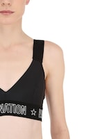 pe nation motion strike sports bra
