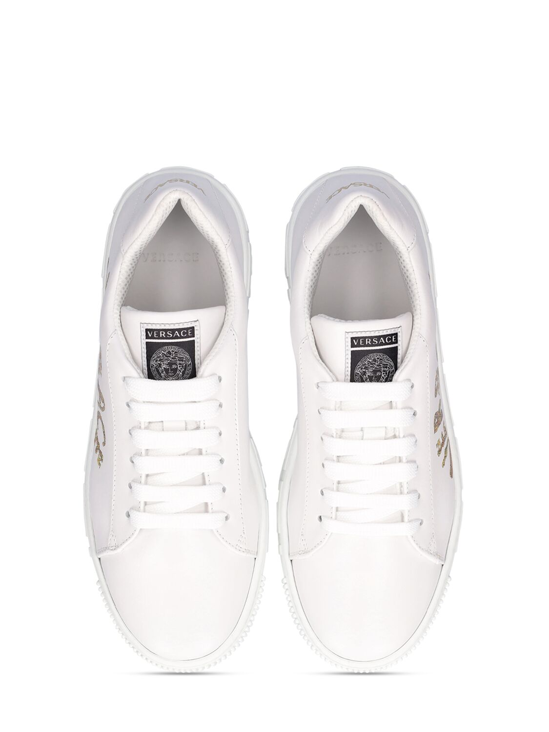 Shop Versace Leather Low Lace-up Sneakers In White