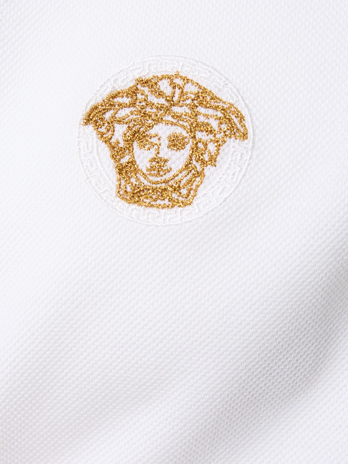 Shop Versace Logo Cotton Polo Shirt In White