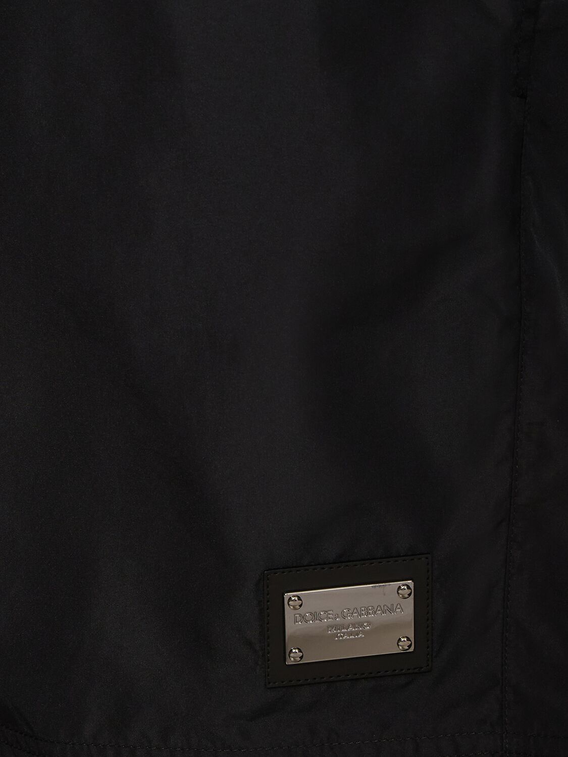 Shop Dolce & Gabbana Solid Color Swim Shorts W/ Logo Plaque In Black