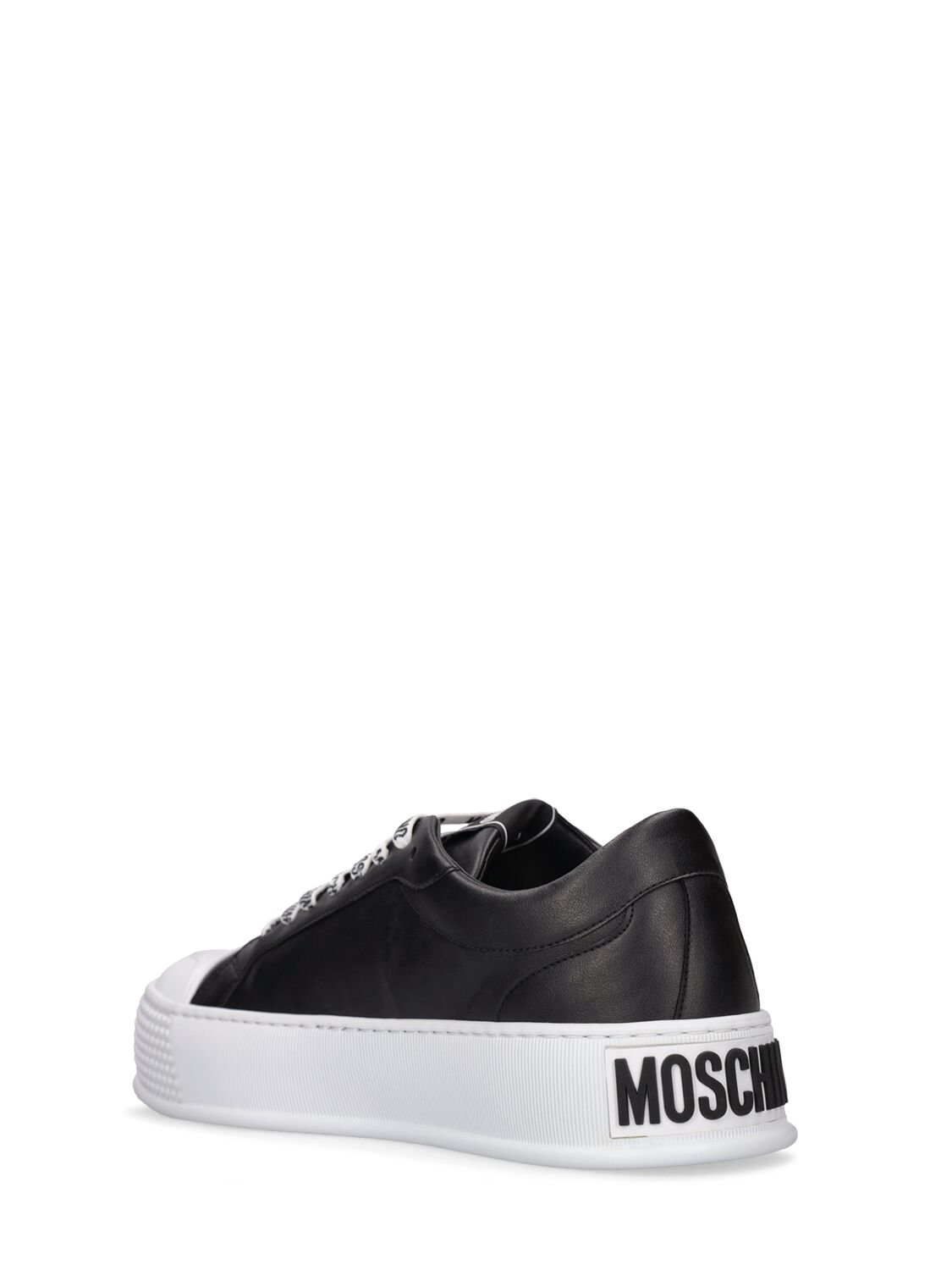 Shop Moschino Logo Faux Leather Low Top Sneakers In Black