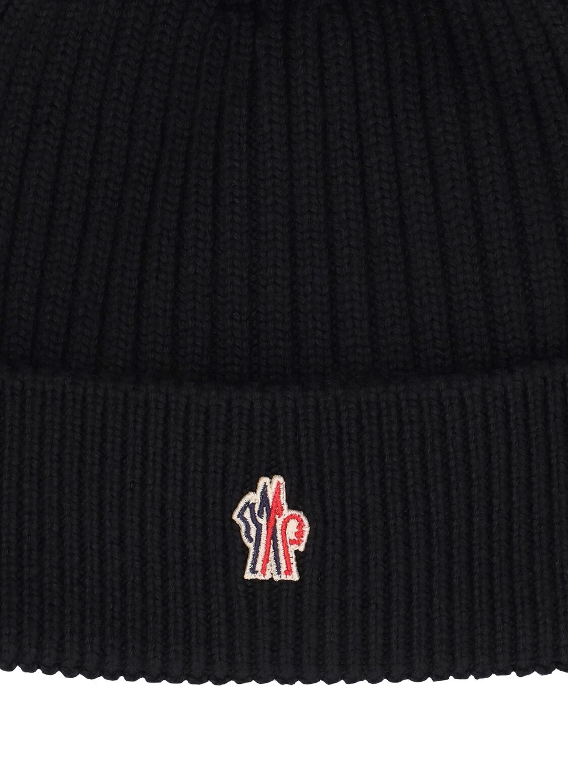 Shop Moncler Ribbed Knit Wool Beanie In Black