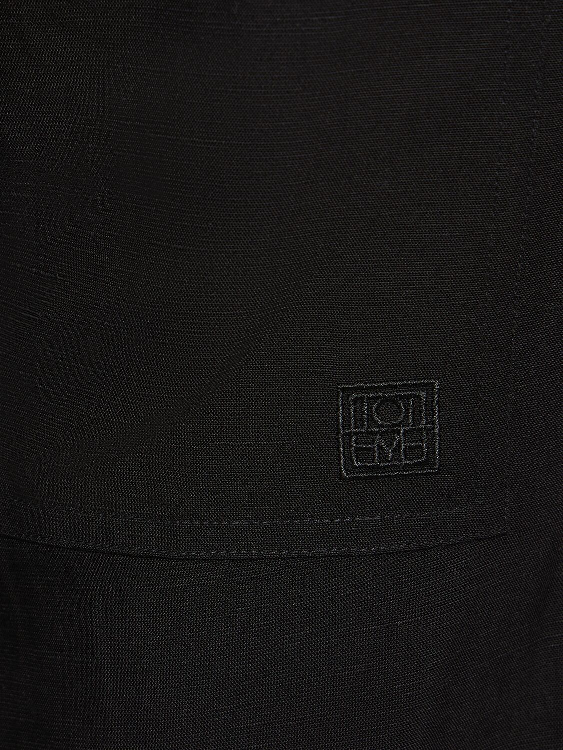 Shop Totême Fluid Jogging Linen Blend Pants In Black