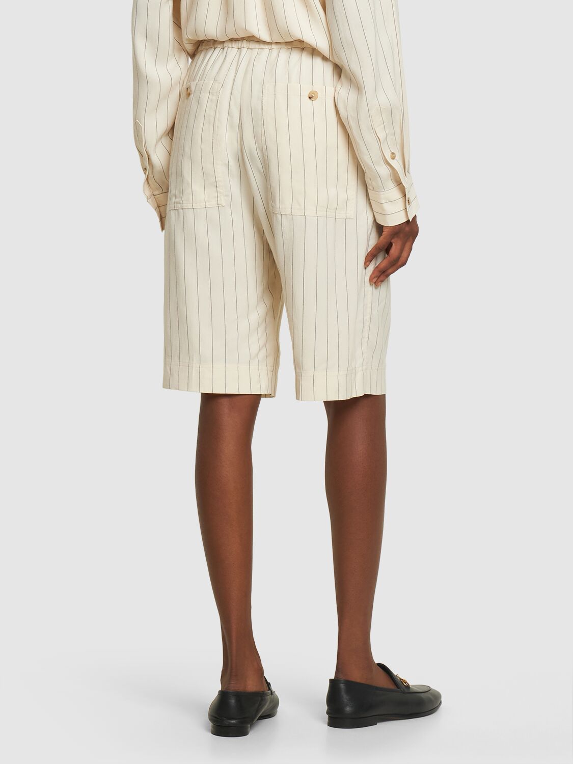 Shop Totême Relaxed Pinstriped Shorts In Ecru,black