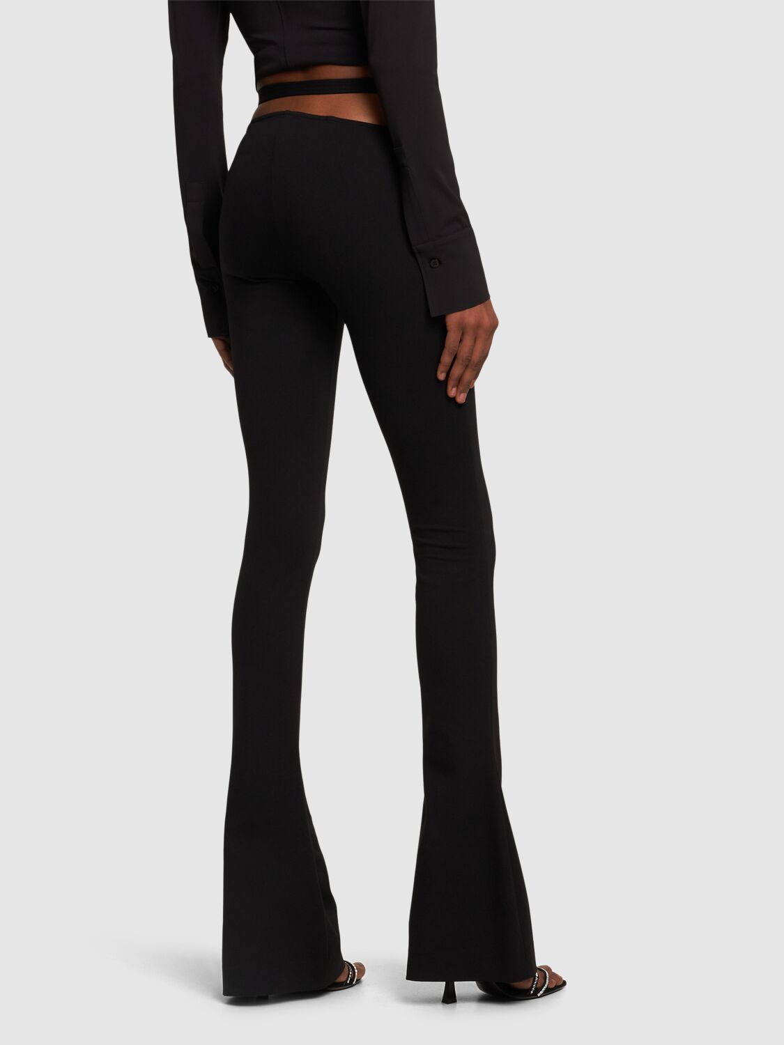 Shop Attico Compact Tech Jersey Cutout Flared Pants In Black