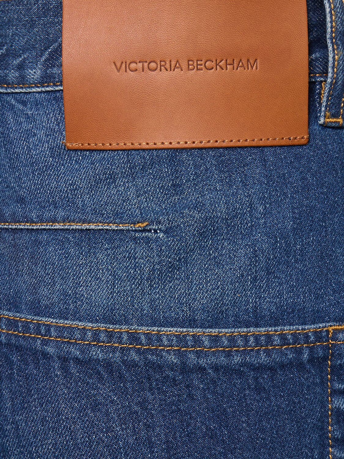 Shop Victoria Beckham Twisted Low-rise Slouch Denim Jeans In Blue