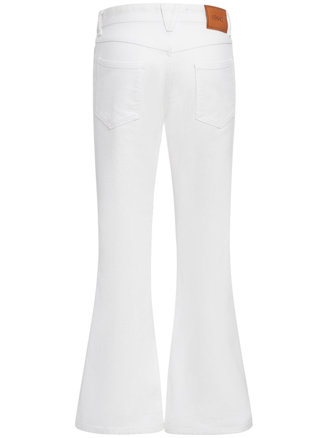 Shop Versace Logo Denim Flared Jeans In White