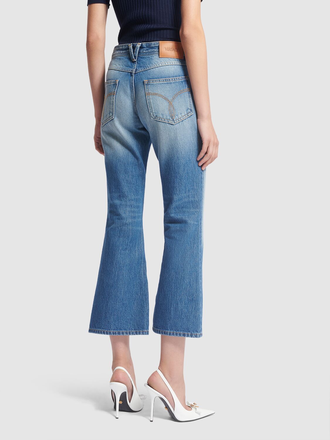 Shop Versace Denim Flared Jeans In Blue
