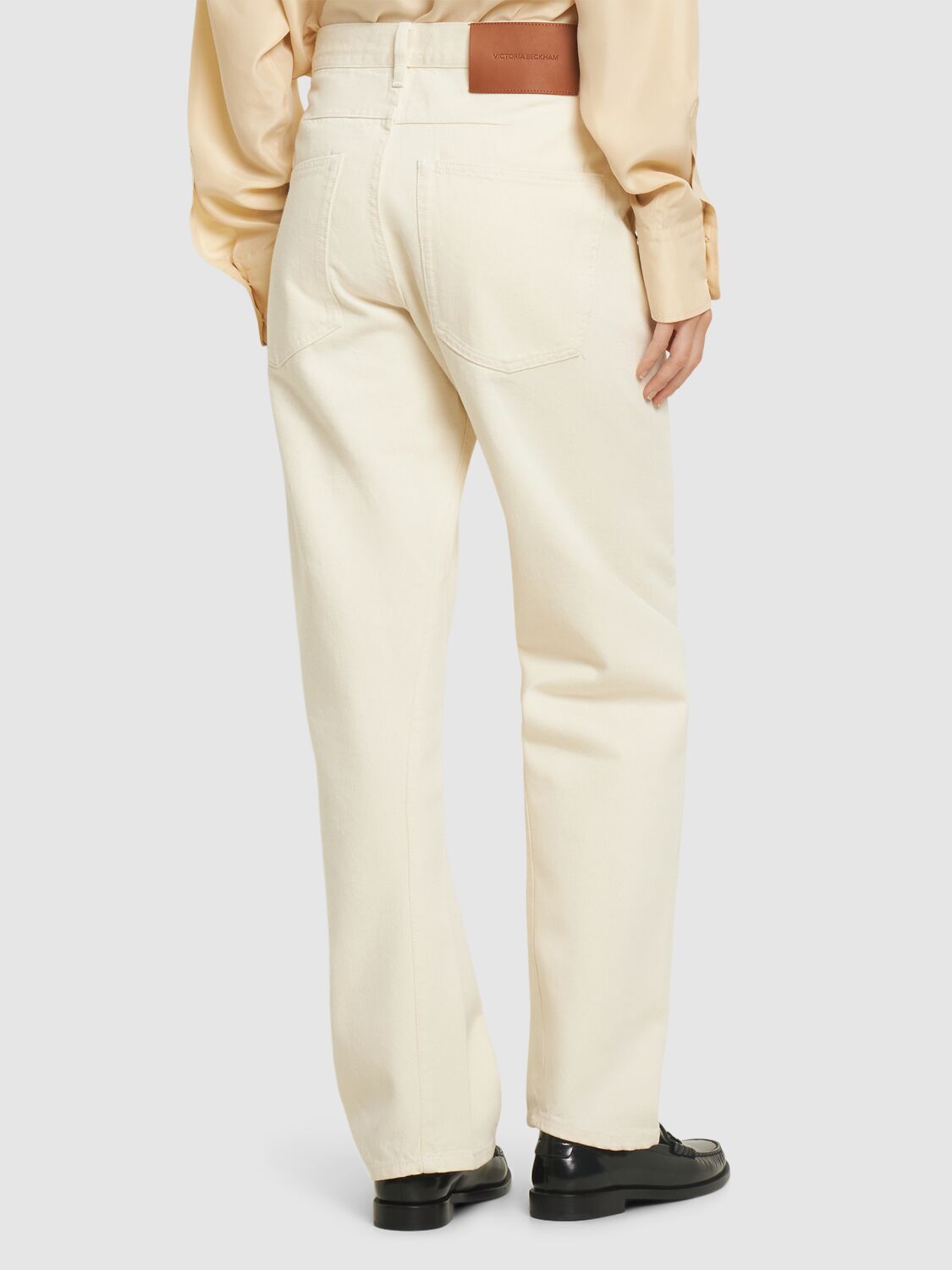 VICTORIA BECKHAM TWISTED LOW-RISE SLOUCH DENIM JEANS 