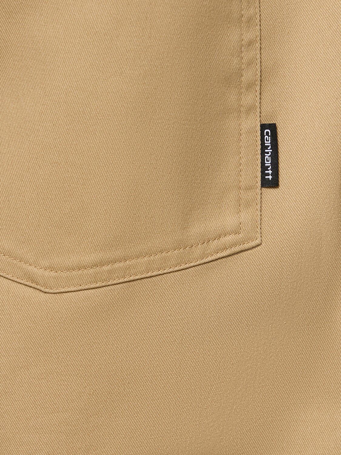 Shop Carhartt Newhaven Rinsed Canvas Pants In Sable Rinsed