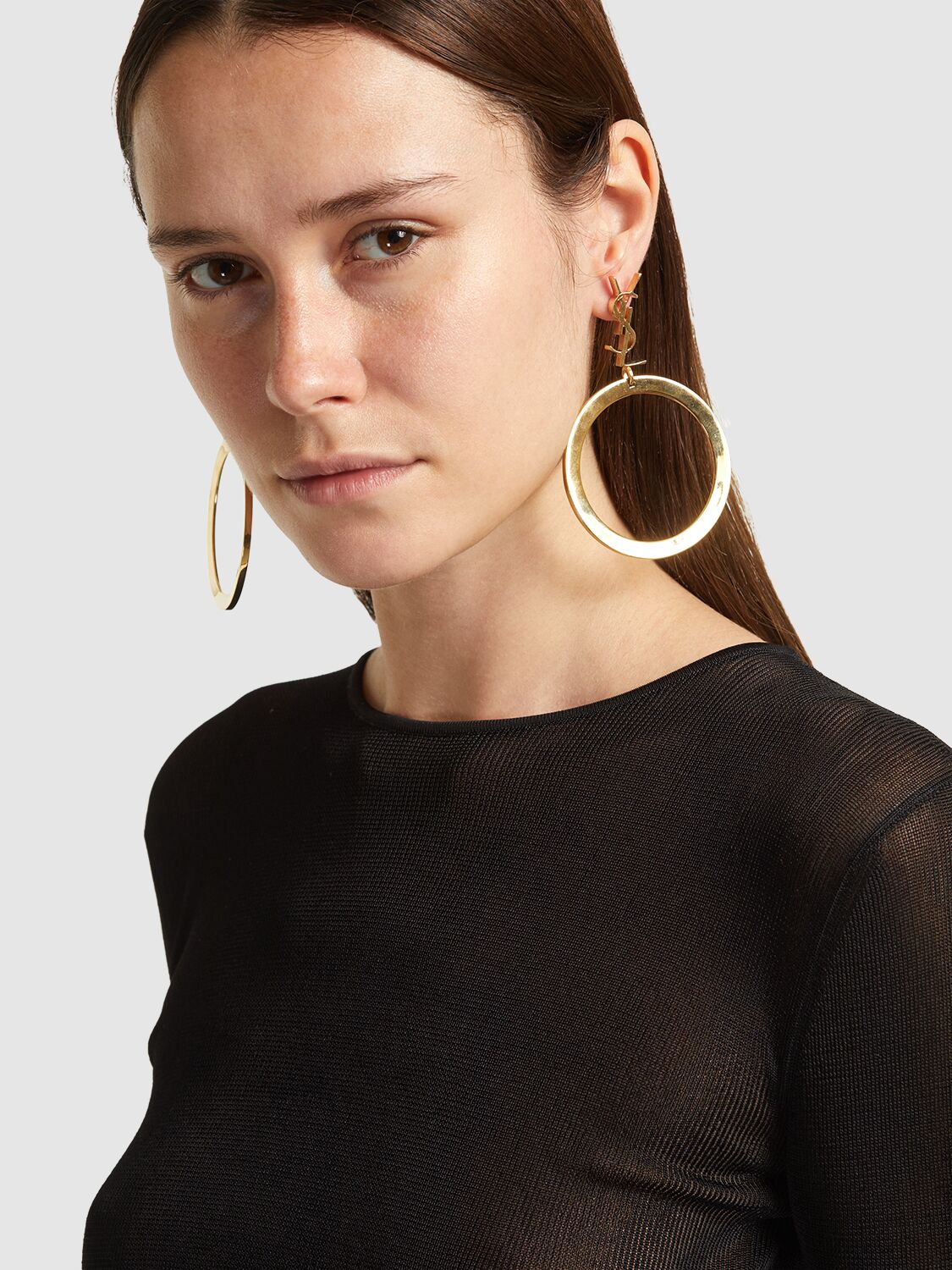 Shop Saint Laurent Brass Hoop Earrings In Gold