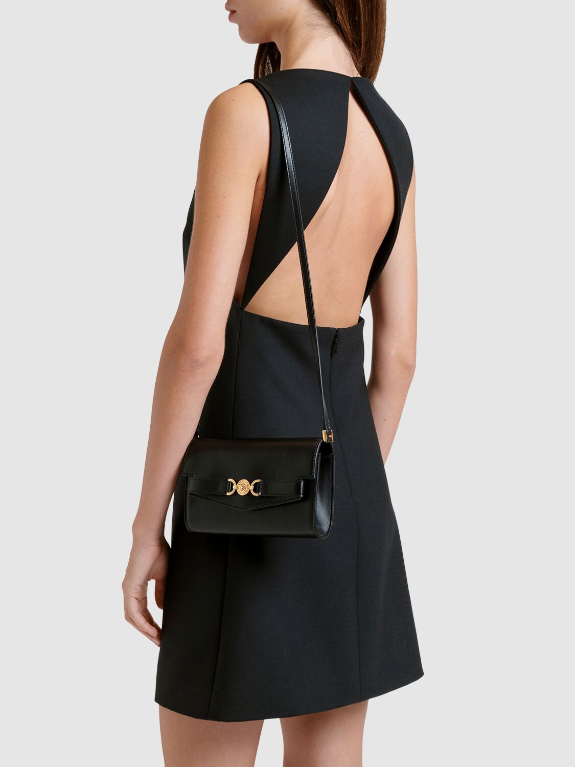 Shop Versace Mini Leather Clutch In Black