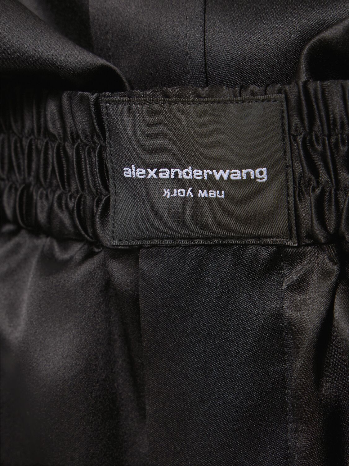 Shop Alexander Wang Button Up Long Sleeve Silk Romper In Black