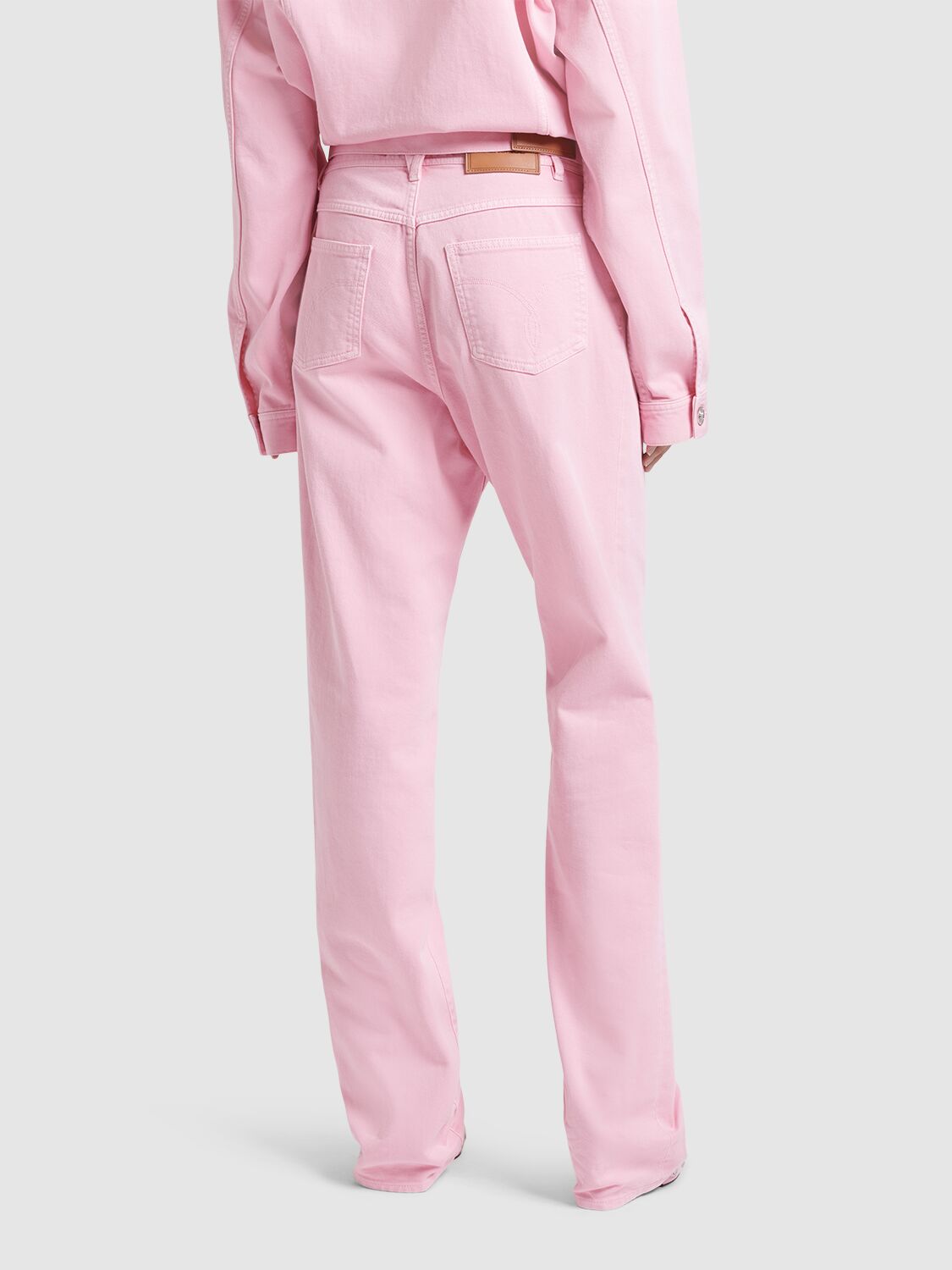Shop Versace Denim Flared Jeans In Pink
