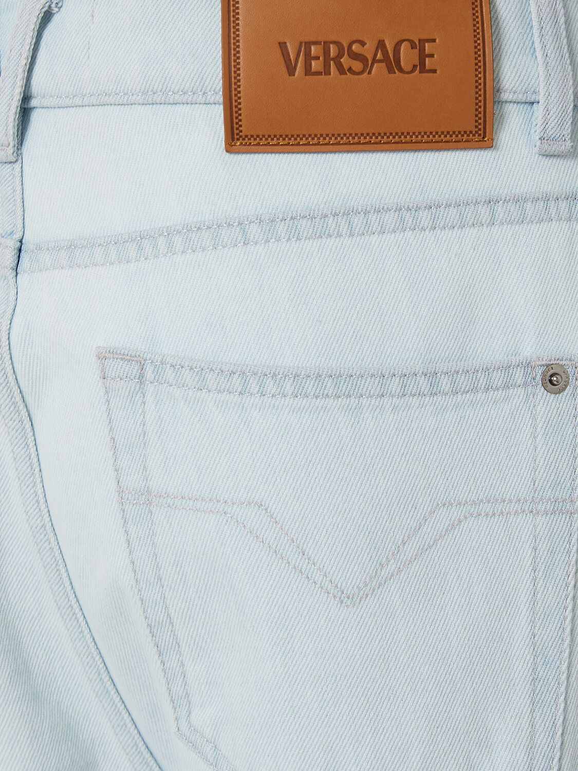 Shop Versace Stonewashed 5 Pocket Jeans In Light Blue