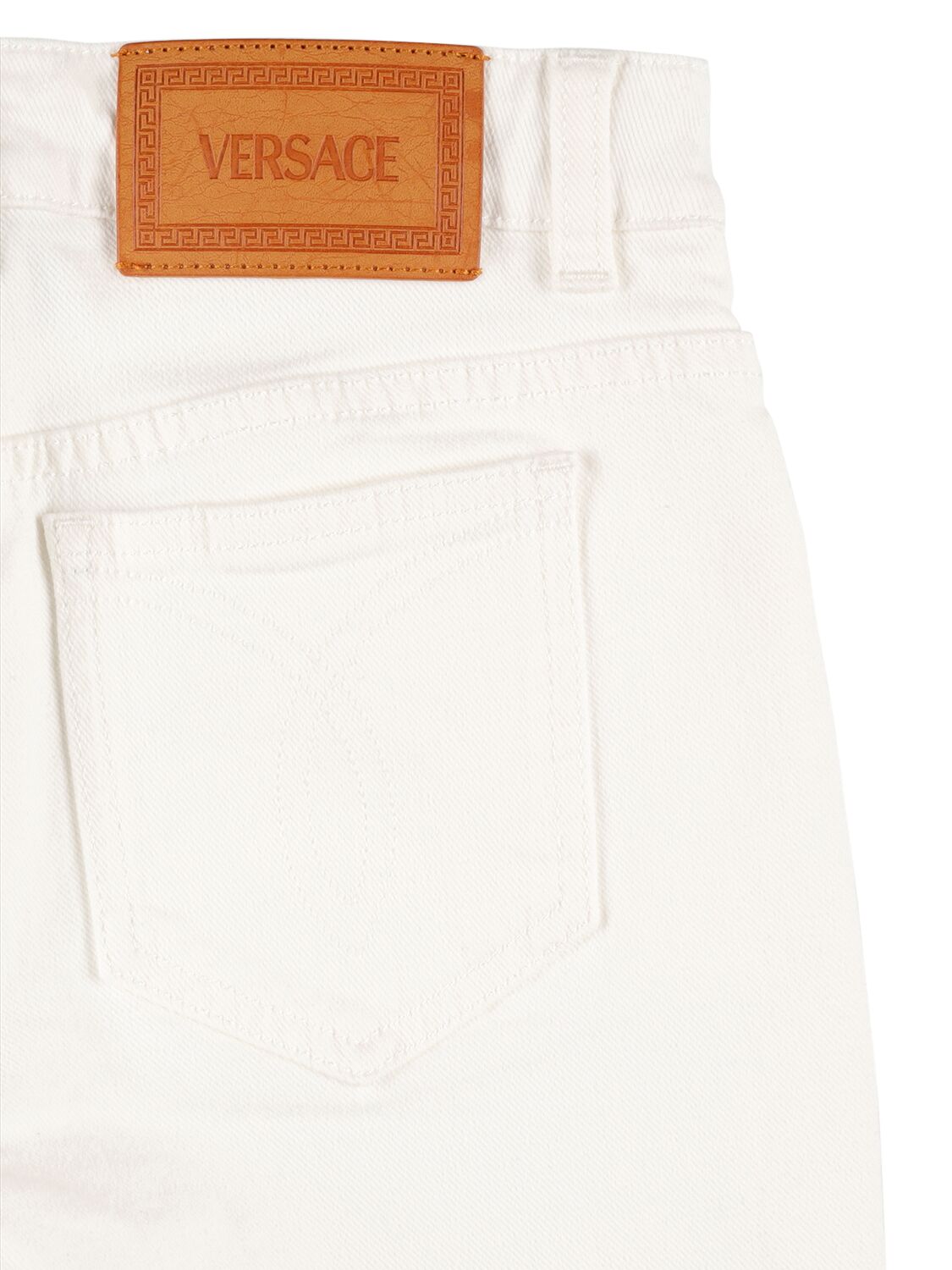 Shop Versace Cotton Denim Pants In White
