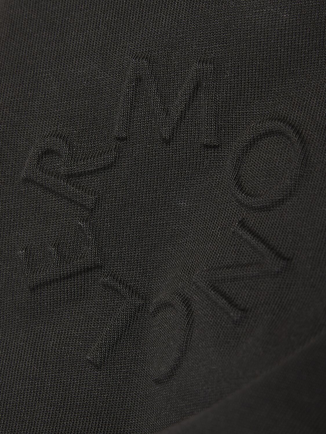 Shop Moncler Embossed Logo Cotton Jersey T-shirt In Black