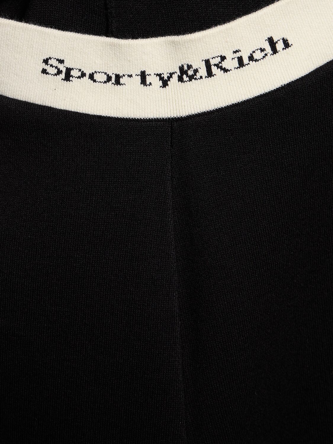 Shop Sporty And Rich Serif Logo High Waist Ribbed Leggings In Black
