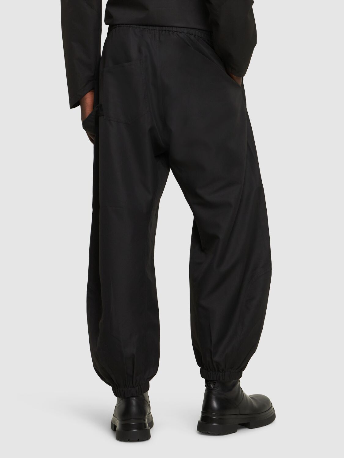 Shop Jw Anderson Twisted Nylon Jogging Pants In Black