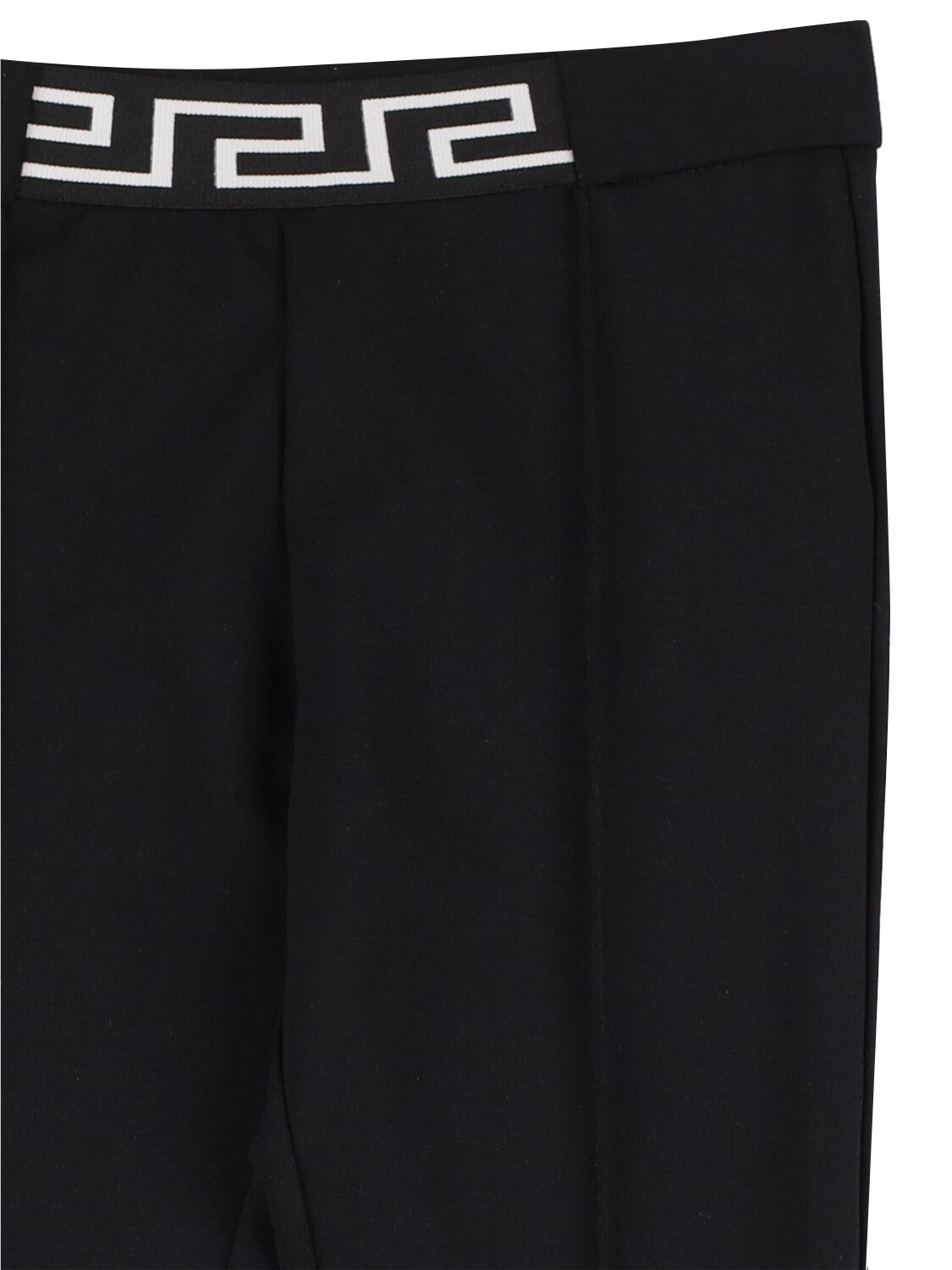 Shop Versace Jersey Interlock Pants In Black