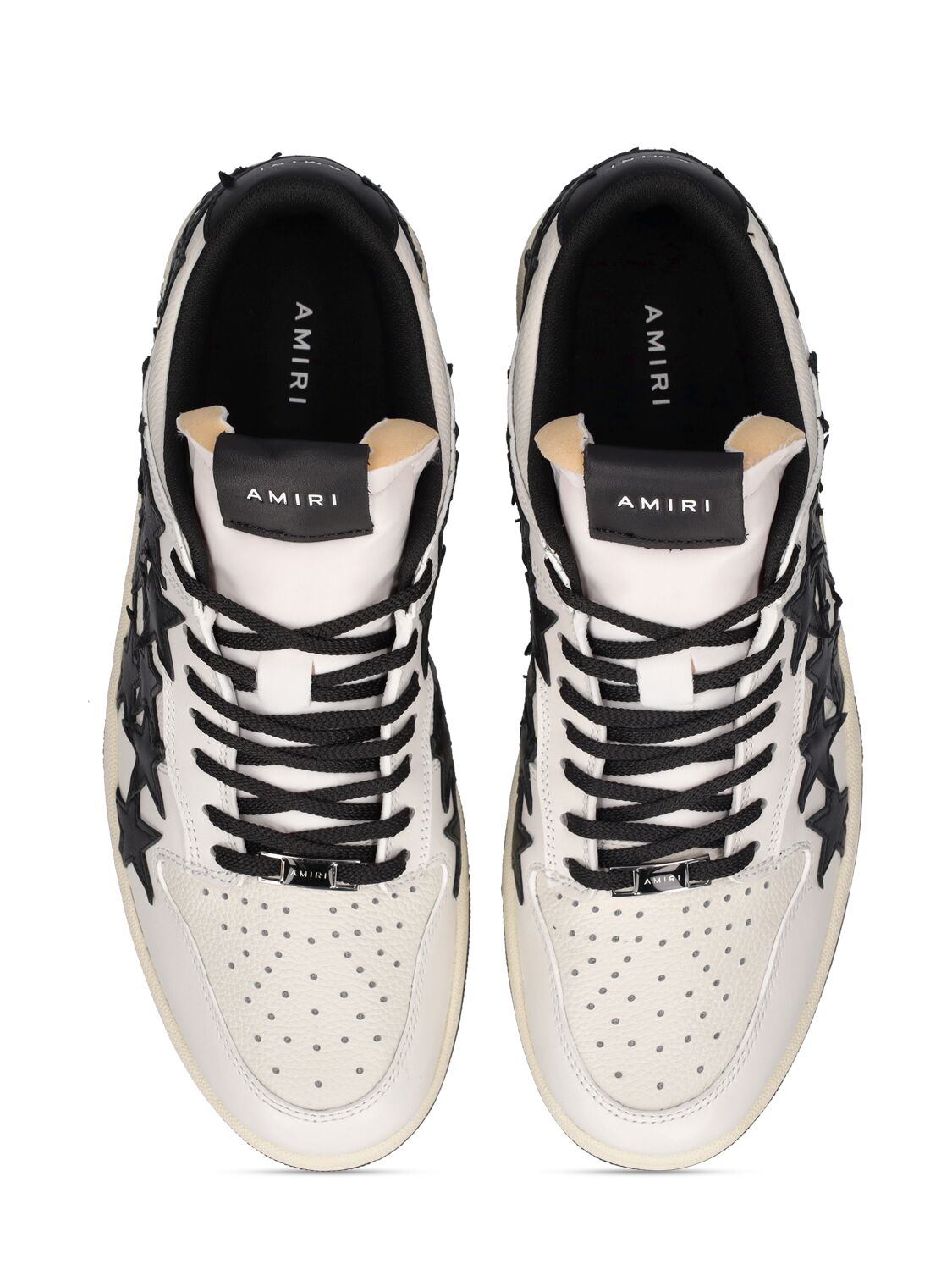 Shop Amiri Stars Leather Low Top Sneakers In White,black