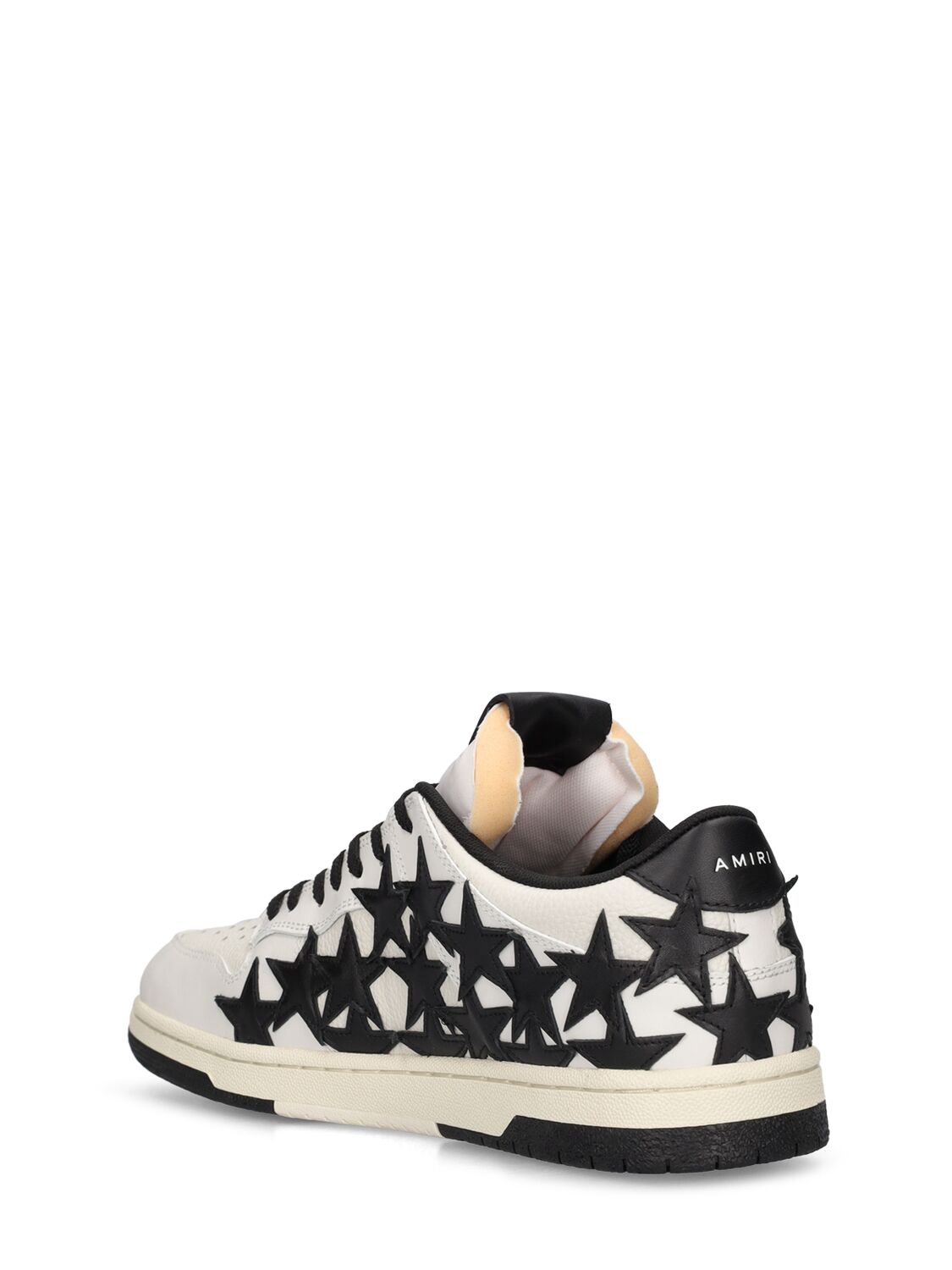 Shop Amiri Stars Leather Low Top Sneakers In White,black