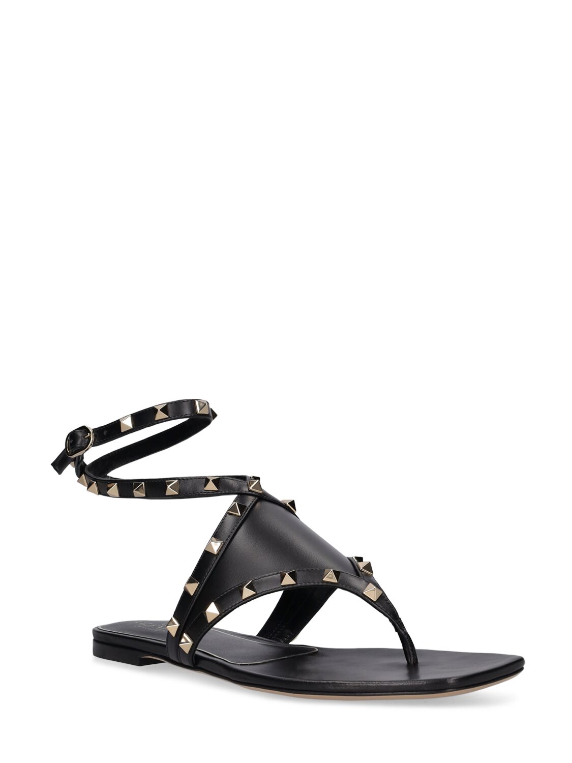 Shop Valentino Rockstud Leather Thong Sandals In Black