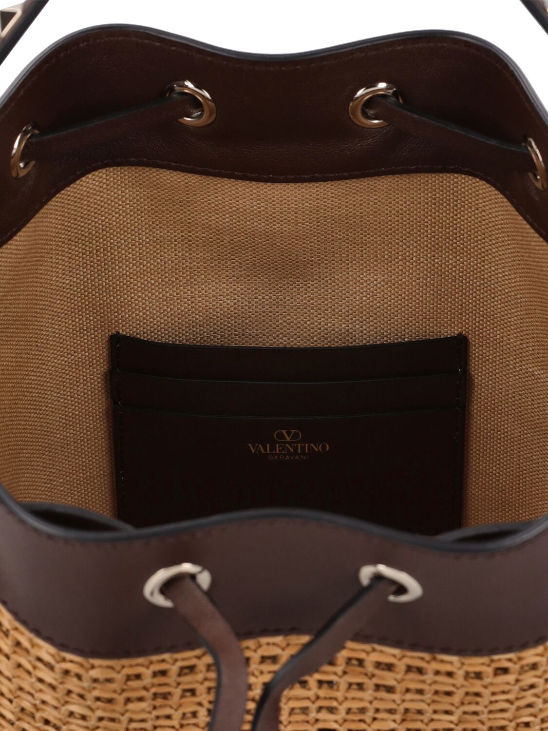 Shop Valentino Rockstud Raffia Effect Bucket Bag In Tabacco,cacao