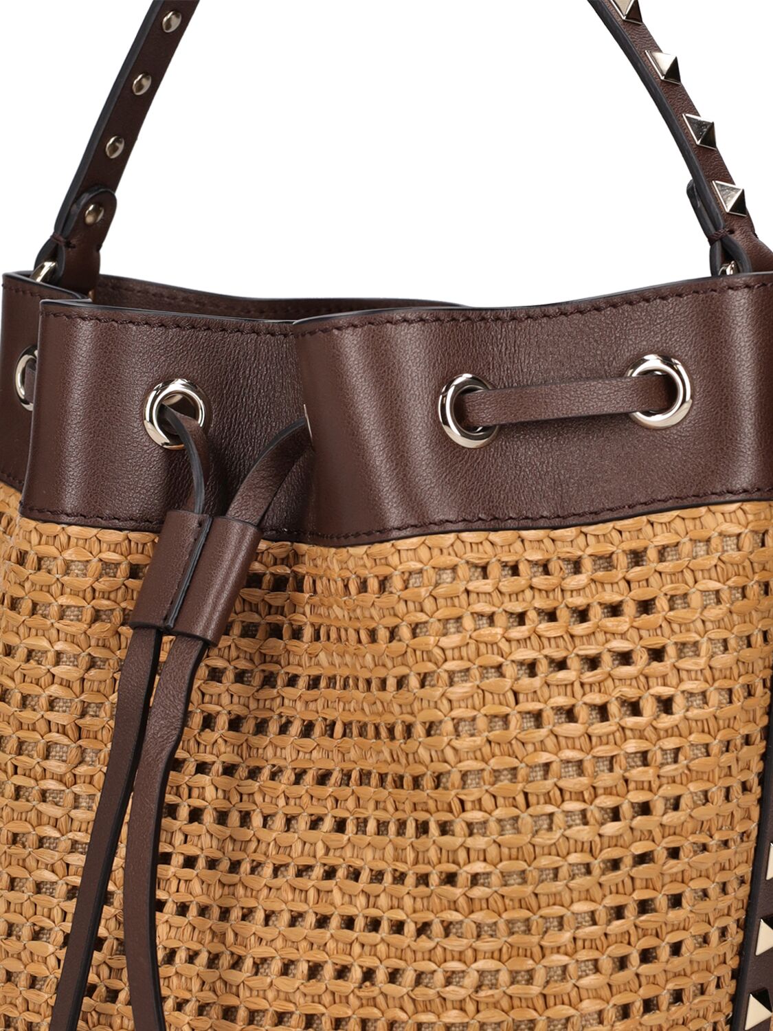 Shop Valentino Rockstud Raffia Effect Bucket Bag In Tabacco,cacao